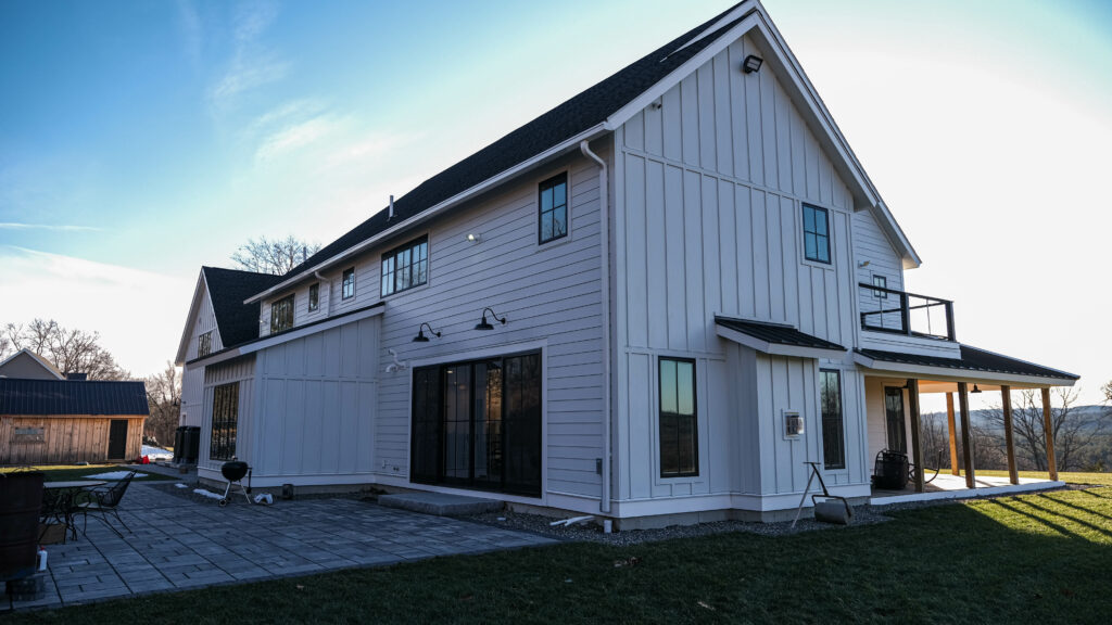Modern Farmhouse with James Hardie Fiber Cement installed as one of the best siding for homes in colorado