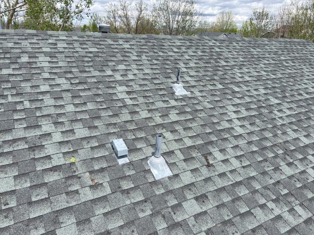 photo of hail damage on a roof in Denver after a storm